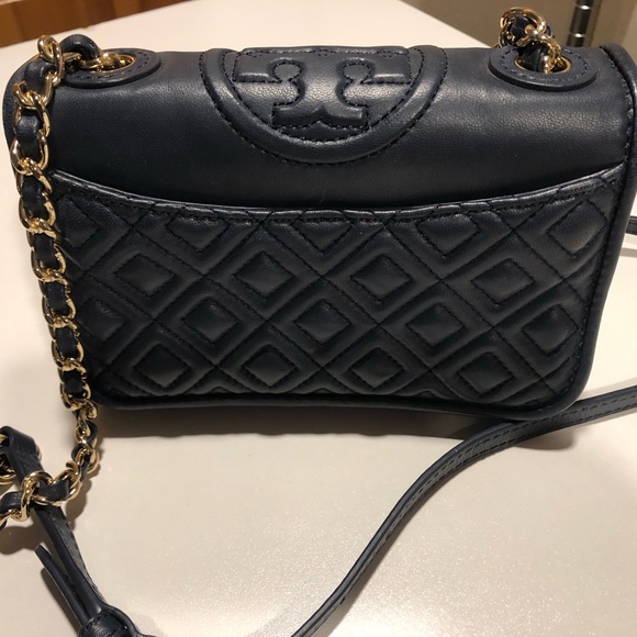Tory Burch Handbags - Tory Burch crossbody/shoulder bag. Navy quilted leather.